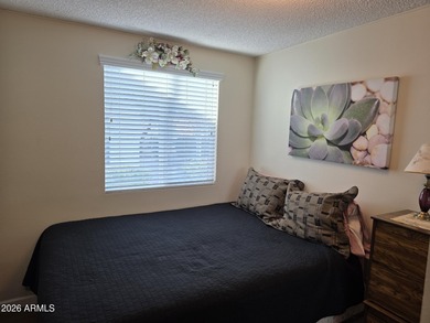 This rare 2bedroom, 2bathroom home offers a spacious living room on Great Eagle Golf Club in Arizona - for sale on GolfHomes.com, golf home, golf lot