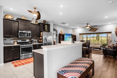 Under contract-accepting backup offers. Enjoy active retirement on Arlington Ridge Golf Club in Florida - for sale on GolfHomes.com, golf home, golf lot