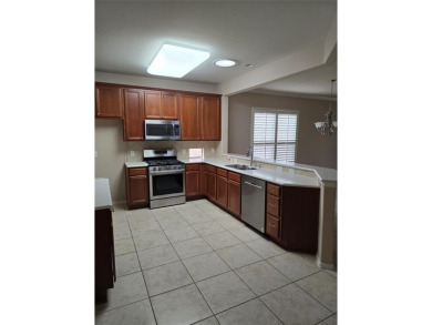 Welcome to this beautifully maintained 2-bedroom, 2-bath home on Oakmont Country Club in Texas - for sale on GolfHomes.com, golf home, golf lot