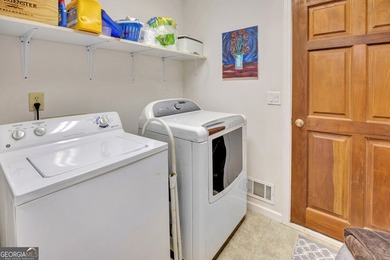 Deeded, Spacious, Gorgeous Waterfront Home 1.6acre on Turtle Cove Golf Course in Georgia - for sale on GolfHomes.com, golf home, golf lot