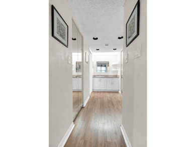 Enjoy the best of 55+ living in this lovely 2-bedroom, 2-bath on Wynmoor Golf Course in Florida - for sale on GolfHomes.com, golf home, golf lot