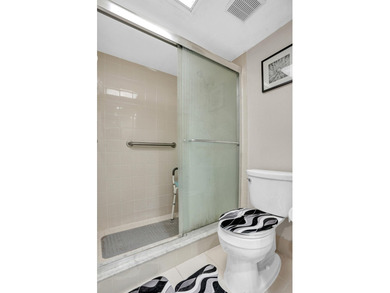 Enjoy the best of 55+ living in this lovely 2-bedroom, 2-bath on Wynmoor Golf Course in Florida - for sale on GolfHomes.com, golf home, golf lot