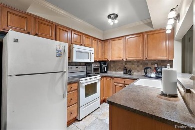 Discover this beautifully updated first floor ranch condo on Maple Lane Golf Club in Michigan - for sale on GolfHomes.com, golf home, golf lot