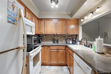 Discover this beautifully updated first floor ranch condo on Maple Lane Golf Club in Michigan - for sale on GolfHomes.com, golf home, golf lot