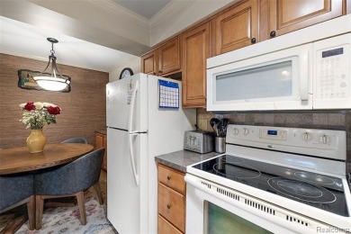 Discover this beautifully updated first floor ranch condo on Maple Lane Golf Club in Michigan - for sale on GolfHomes.com, golf home, golf lot