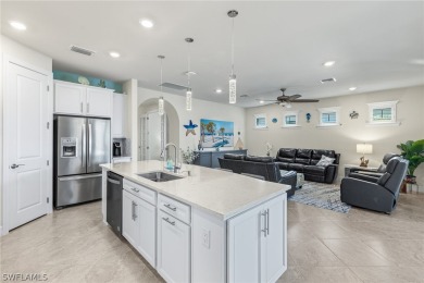 This FULLY FURNISHED Summerwood plan pool home offers the best on Gateway Golf and Country Club in Florida - for sale on GolfHomes.com, golf home, golf lot