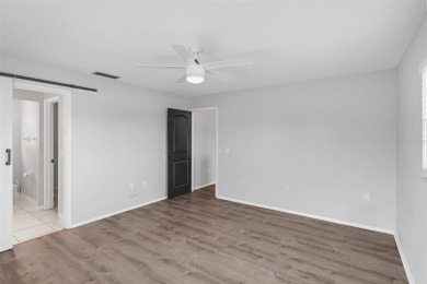 Move-in ready, fully remodeled Florida-style home on a corner on Oyster Creek Golf Club in Florida - for sale on GolfHomes.com, golf home, golf lot
