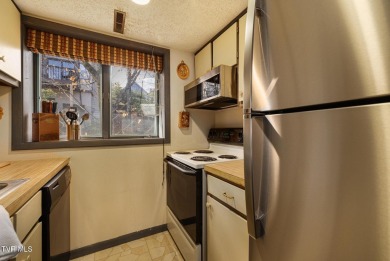 Check out this fabulous condo in Beech Mountain! Sweeping on Beech Mountain Club in North Carolina - for sale on GolfHomes.com, golf home, golf lot