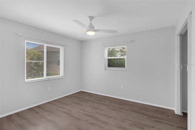 Move-in ready, fully remodeled Florida-style home on a corner on Oyster Creek Golf Club in Florida - for sale on GolfHomes.com, golf home, golf lot