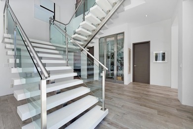 A contemporary, light-filled home on an oversized lot with 165 on Boca Raton Resort and Club in Florida - for sale on GolfHomes.com, golf home, golf lot