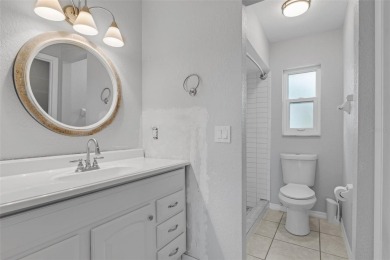 Move-in ready, fully remodeled Florida-style home on a corner on Oyster Creek Golf Club in Florida - for sale on GolfHomes.com, golf home, golf lot