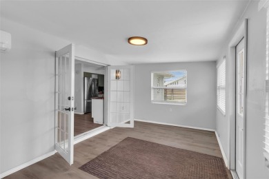 Move-in ready, fully remodeled Florida-style home on a corner on Oyster Creek Golf Club in Florida - for sale on GolfHomes.com, golf home, golf lot