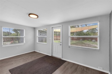 Move-in ready, fully remodeled Florida-style home on a corner on Oyster Creek Golf Club in Florida - for sale on GolfHomes.com, golf home, golf lot