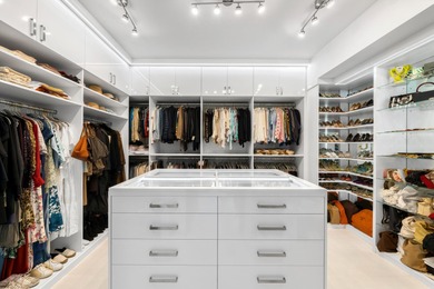 A contemporary, light-filled home on an oversized lot with 165 on Boca Raton Resort and Club in Florida - for sale on GolfHomes.com, golf home, golf lot