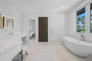 A contemporary, light-filled home on an oversized lot with 165 on Boca Raton Resort and Club in Florida - for sale on GolfHomes.com, golf home, golf lot