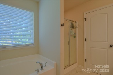 Welcome to 136 Wood Duck Loop - Set on a private lot backing up on Mallard Head Country Club in North Carolina - for sale on GolfHomes.com, golf home, golf lot