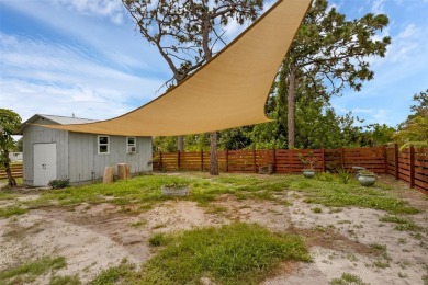 Move-in ready, fully remodeled Florida-style home on a corner on Oyster Creek Golf Club in Florida - for sale on GolfHomes.com, golf home, golf lot