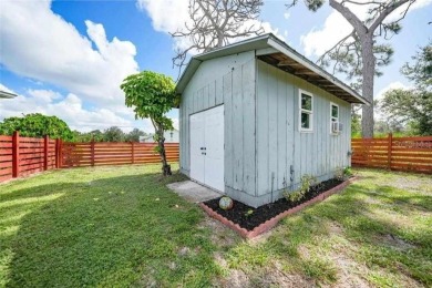 Move-in ready, fully remodeled Florida-style home on a corner on Oyster Creek Golf Club in Florida - for sale on GolfHomes.com, golf home, golf lot