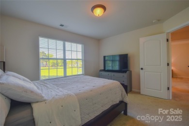 Welcome to 136 Wood Duck Loop - Set on a private lot backing up on Mallard Head Country Club in North Carolina - for sale on GolfHomes.com, golf home, golf lot