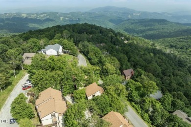Check out this fabulous condo in Beech Mountain! Sweeping on Beech Mountain Club in North Carolina - for sale on GolfHomes.com, golf home, golf lot
