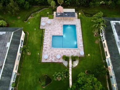 CORNER ground floor 2/2 unit RARELY available in sought-after on Wynmoor Golf Course in Florida - for sale on GolfHomes.com, golf home, golf lot