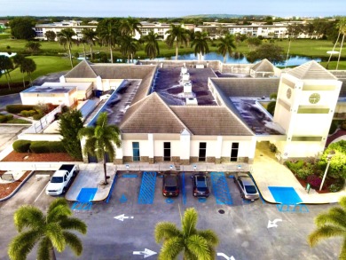 CORNER ground floor 2/2 unit RARELY available in sought-after on Wynmoor Golf Course in Florida - for sale on GolfHomes.com, golf home, golf lot