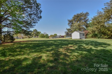 Welcome to 136 Wood Duck Loop - Set on a private lot backing up on Mallard Head Country Club in North Carolina - for sale on GolfHomes.com, golf home, golf lot