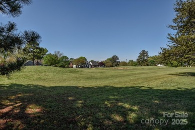 Welcome to 136 Wood Duck Loop - Set on a private lot backing up on Mallard Head Country Club in North Carolina - for sale on GolfHomes.com, golf home, golf lot