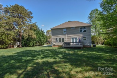 Welcome to 136 Wood Duck Loop - Set on a private lot backing up on Mallard Head Country Club in North Carolina - for sale on GolfHomes.com, golf home, golf lot