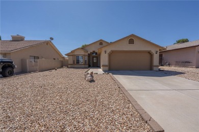 Charming 3 bed, 2 bath home built in 2001 with vaulted ceilings on Cerbat Cliffs Golf Course in Arizona - for sale on GolfHomes.com, golf home, golf lot