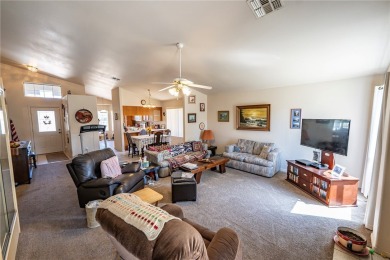 Charming 3 bed, 2 bath home built in 2001 with vaulted ceilings on Cerbat Cliffs Golf Course in Arizona - for sale on GolfHomes.com, golf home, golf lot