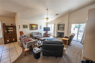Charming 3 bed, 2 bath home built in 2001 with vaulted ceilings on Cerbat Cliffs Golf Course in Arizona - for sale on GolfHomes.com, golf home, golf lot