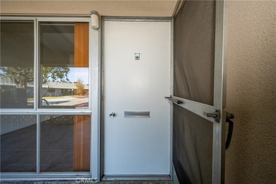 Freshly painted and beautifully refreshed, this inviting on Leisure World Seal Beach Golf Course in California - for sale on GolfHomes.com, golf home, golf lot