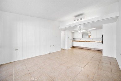 Freshly painted and beautifully refreshed, this inviting on Leisure World Seal Beach Golf Course in California - for sale on GolfHomes.com, golf home, golf lot