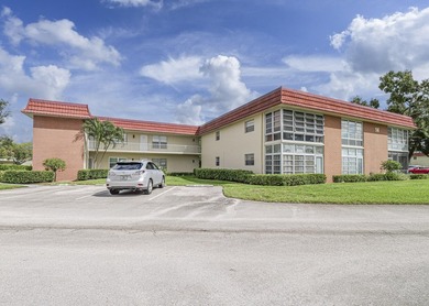 Move-in ready FIRST FLOOR 1BR/1.5BA in the desirable Vista on The American Golf Club in Florida - for sale on GolfHomes.com, golf home, golf lot
