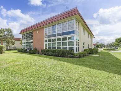 Move-in ready FIRST FLOOR 1BR/1.5BA in the desirable Vista on The American Golf Club in Florida - for sale on GolfHomes.com, golf home, golf lot