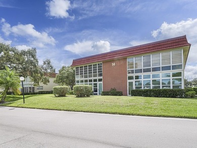 Move-in ready FIRST FLOOR 1BR/1.5BA in the desirable Vista on The American Golf Club in Florida - for sale on GolfHomes.com, golf home, golf lot