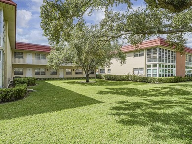 Move-in ready FIRST FLOOR 1BR/1.5BA in the desirable Vista on The American Golf Club in Florida - for sale on GolfHomes.com, golf home, golf lot