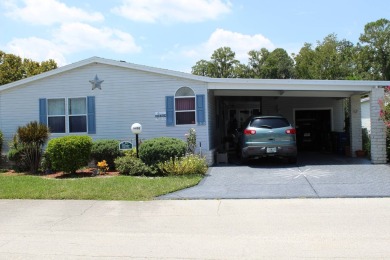 Charming Turn-Key 3-Bedroom Home with All Seasons Room and Pond on Schalamar Creek Golf and Country Club in Florida - for sale on GolfHomes.com, golf home, golf lot