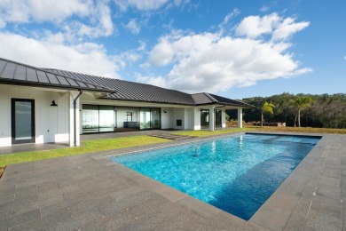 Shades of blue emerge as you enter this all new, custom, coastal on Kapalua Golf Club - Bay Course in Hawaii - for sale on GolfHomes.com, golf home, golf lot