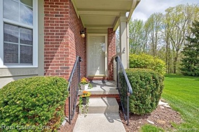 Beautiful End Unit Ranch Condo in Desirable Golf Community! on The Captains Club At Woodfield in Michigan - for sale on GolfHomes.com, golf home, golf lot