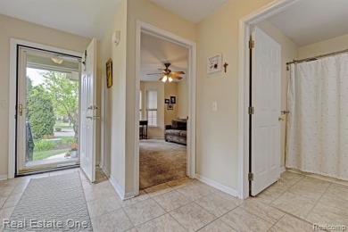Beautiful End Unit Ranch Condo in Desirable Golf Community! on The Captains Club At Woodfield in Michigan - for sale on GolfHomes.com, golf home, golf lot