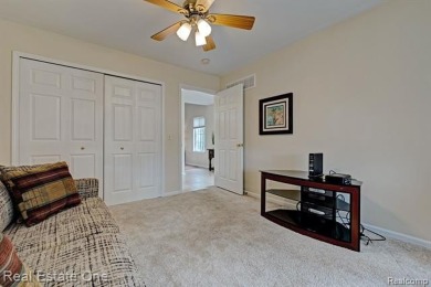 Beautiful End Unit Ranch Condo in Desirable Golf Community! on The Captains Club At Woodfield in Michigan - for sale on GolfHomes.com, golf home, golf lot