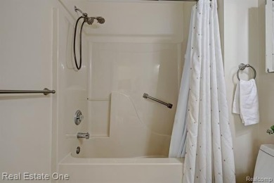 Beautiful End Unit Ranch Condo in Desirable Golf Community! on The Captains Club At Woodfield in Michigan - for sale on GolfHomes.com, golf home, golf lot