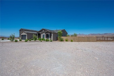 Has it all!! Absolute stunning custom home located in one of the on Laughlin Ranch Golf Club in Arizona - for sale on GolfHomes.com, golf home, golf lot