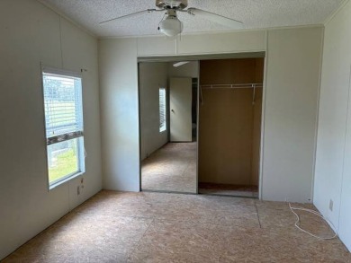 This home is in a 55 plus community with a monthly lot rent of on Crystal Lake Club in Florida - for sale on GolfHomes.com, golf home, golf lot