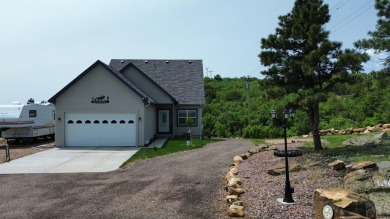 Experience this oasis on the bluff with incredible views of the on Hollydot Golf Course in Colorado - for sale on GolfHomes.com, golf home, golf lot