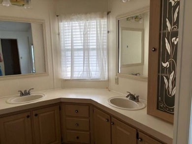 This home is in a 55 plus community with a monthly lot rent of on Crystal Lake Club in Florida - for sale on GolfHomes.com, golf home, golf lot
