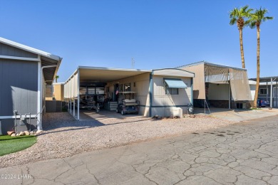 *ON LEASED LAND*

Paradise is Found! Don't judge the book by on London Bridge Golf Course in Arizona - for sale on GolfHomes.com, golf home, golf lot