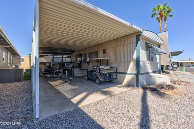 *ON LEASED LAND*

Paradise is Found! Don't judge the book by on London Bridge Golf Course in Arizona - for sale on GolfHomes.com, golf home, golf lot